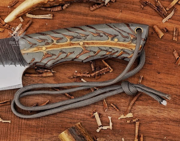 skinning knife with pinecone handle grip