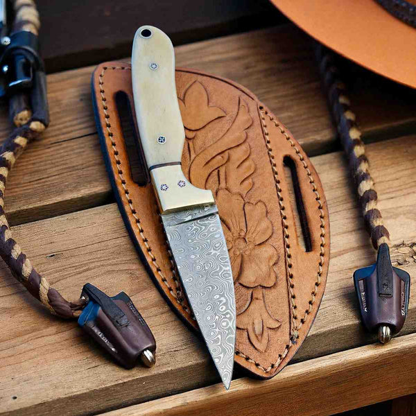 Damascus Elite Camel Bone Buckaroo knife with tooled leather pancake sheath