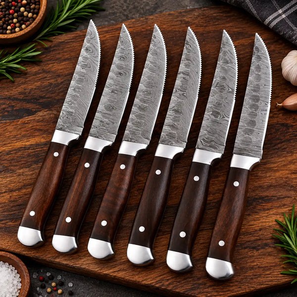 6 piece Damascus steel knife set with serrated blades and dark wooden handles