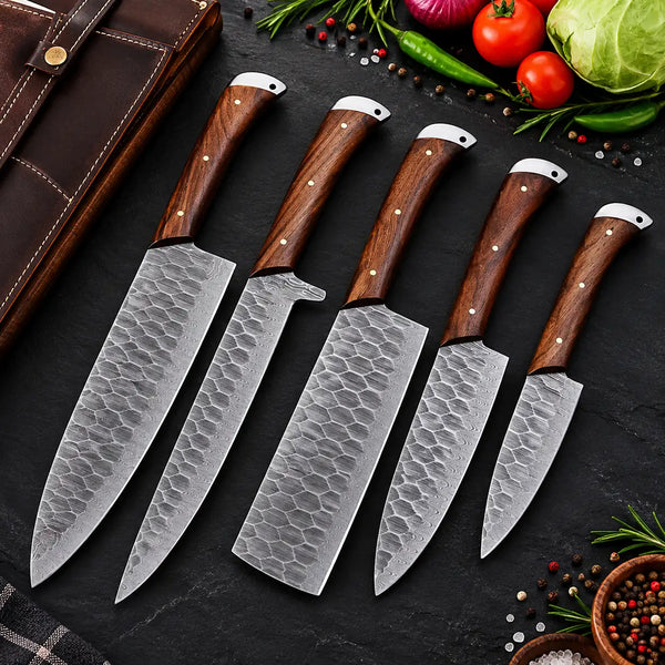 Five-piece hammered Damascus kitchen knife set with wood handles and steel pommel caps