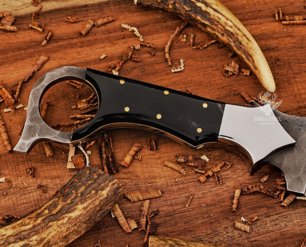 Ringtail hunting knife featuring bull horn handle details