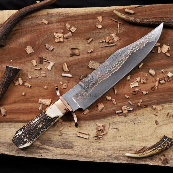 copper damascus bowie knife closeup of other side