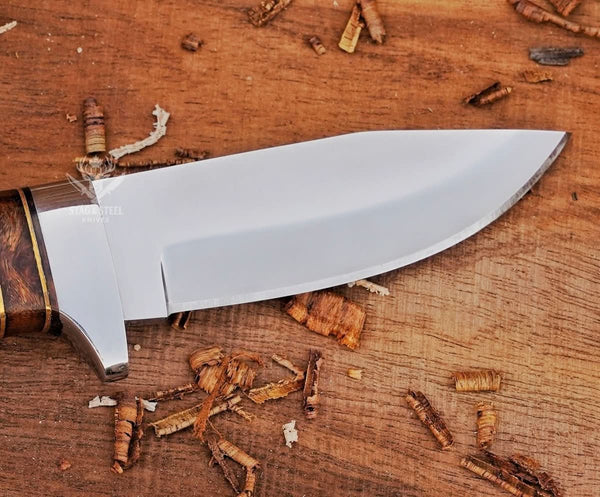 Close-up of D2 steel blade on small hunting knife