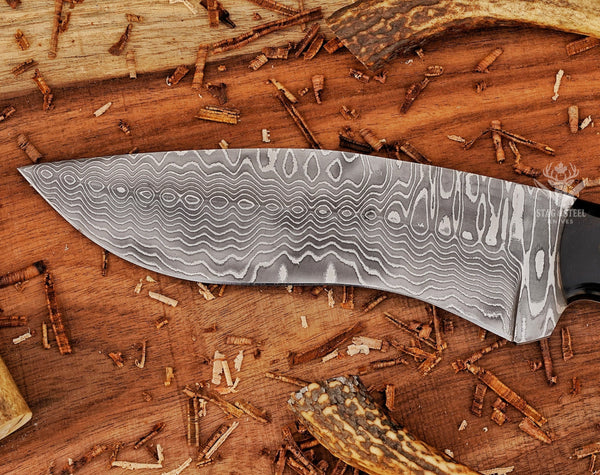 Close-up of Damascus steel blade pattern on Kukri Bowie knife