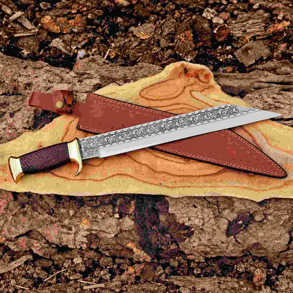 Handmade engraved dirk dagger with brass crossguard and tooled leather sheath