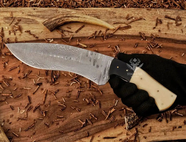 Hand-forged Damascus Kukri Bowie knife crafted for outdoor use