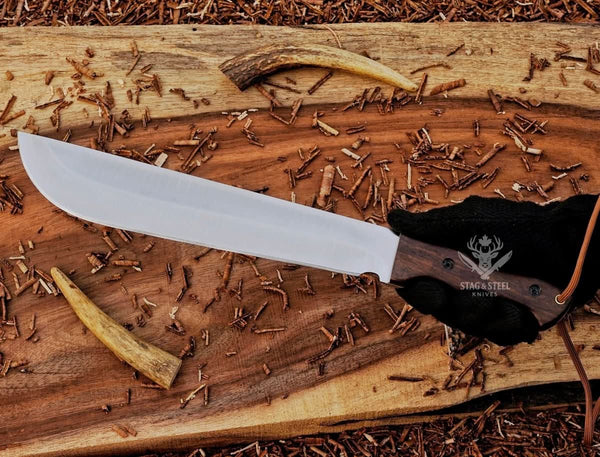 Close-up of Ironwood handle on full tang D2 machete knife with handle pins and lanyard hole