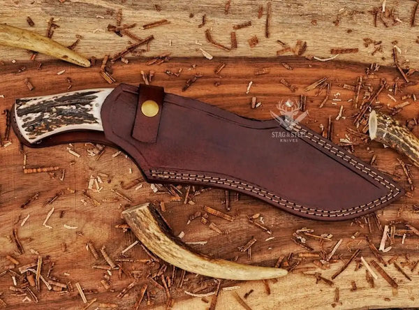 Kukri Bowie knife front view showing hand-forged Damascus steel blade