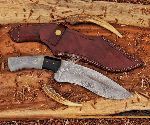 Handmade Kukri Bowie knife displayed with genuine leather sheath