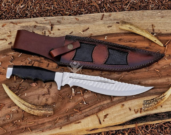 large bowie knife with leather sheath