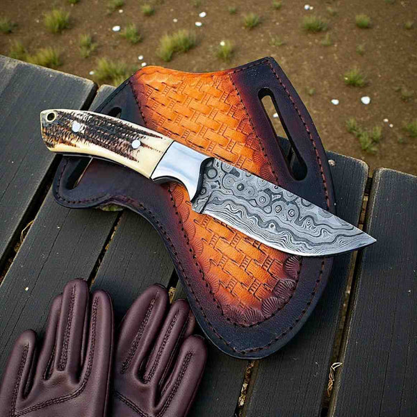 Handmade Skinning knife with Stag horn with leather sheath.