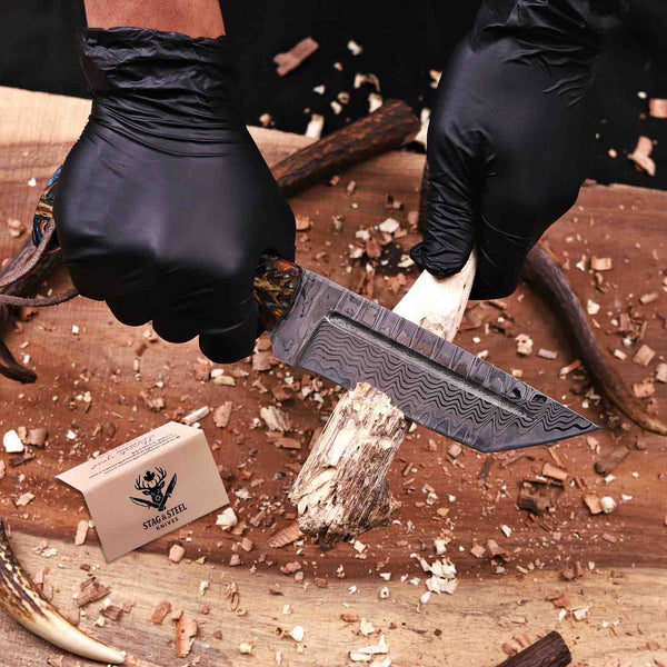 Damascus tanto knife cutting wood showing tip strength