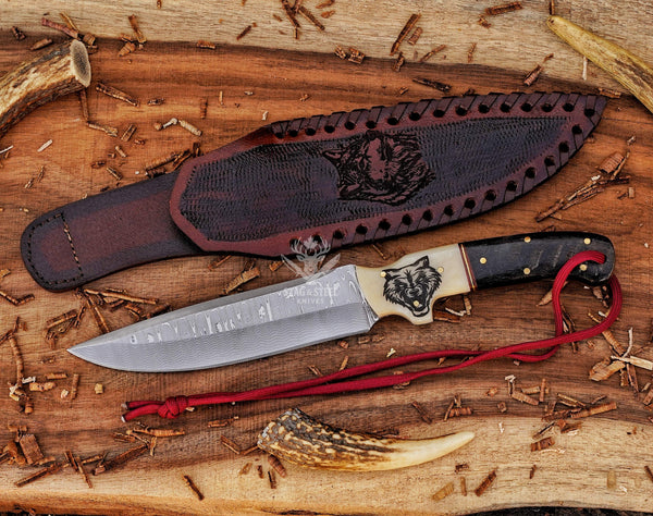 Custom Damascus Hunting Knife – Wolf Engraved handle