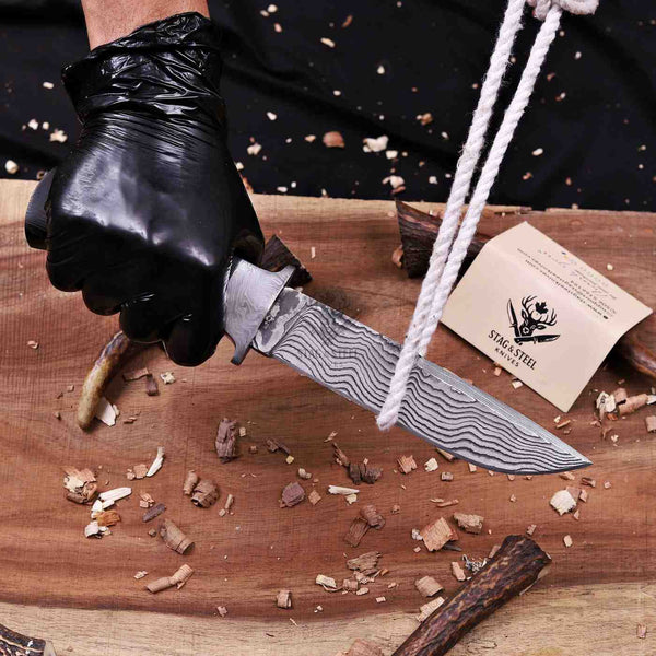 Full profile of 6.5 inch VG10 Damascus hunting knife with wenge handle