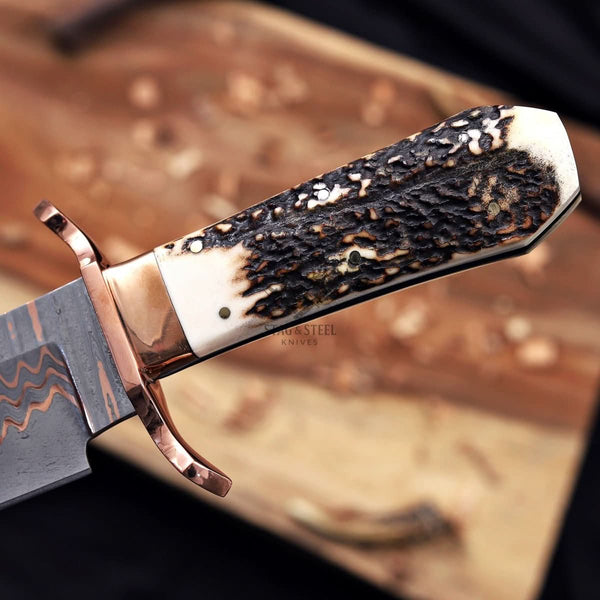 Antler handle bowie knife close up texture detail