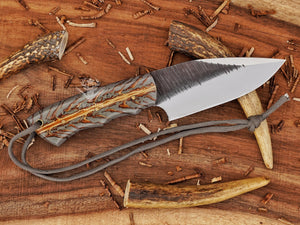 Best skinning knife with D2 steel blade and pinecone handle for deer hunting