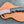 Buffalo horn Damascus hawkbill knife on a tooled cross draw leather sheath