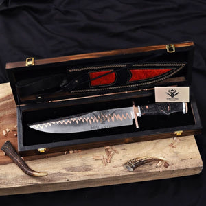 Copper Damascus Bowie knife with custom leather sheath and Stag & Steel branding in a premium wooden display box.