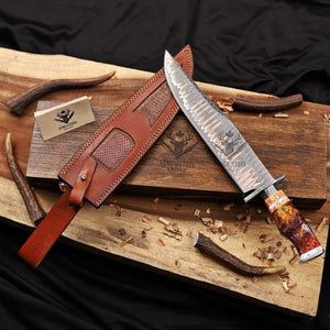Custom handmade Copper Damascus Bowie knife with vibrant resin handle, full tang construction, and leather sheath, available in Canada.