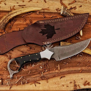 Custom ringtail hunting knife with D2 steel blade and maple leaf engraved leather sheath