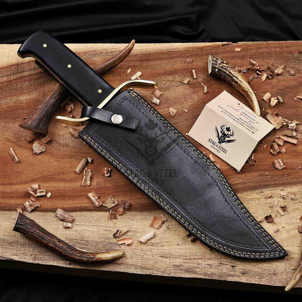 Western Damascus bowie knife in black leather sheath and Stag Steel Knives care card