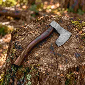 Damascus steel axe featuring a handcrafted rosewood handle