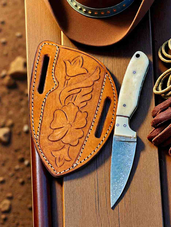 Damascus Elite Camel Bone Buckaroo knife with tooled leather pancake sheath
