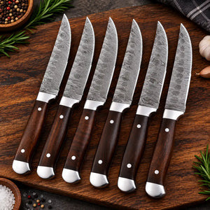6 piece Damascus steel knife set with serrated blades and dark wooden handles 