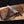 Damascus chef's knife with resin handle, two-tone leather sheath, and wood box