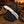 A Hawkbill knife with a Camel bone handle with rasp steel blade and pancake leather sheath