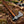 Hand-forged Damascus bushcraft axe with a wooden handle for outdoor use