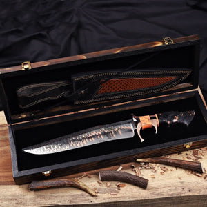 Premium Cu-Mai Bowie knife with custom resin handle and solid copper guard, presented inside a handcrafted wooden display box with a textured leather sheath."