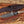 Premium D2 hunting knife with engraved wolf artwork and leather sheath