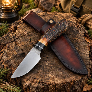 Handmade stag handle skinner knife with 440C drop point blade and hand-dyed leather sheath
