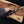 Close-up of polished brass scrolled S-guard on Alamo Musso bowie knife
