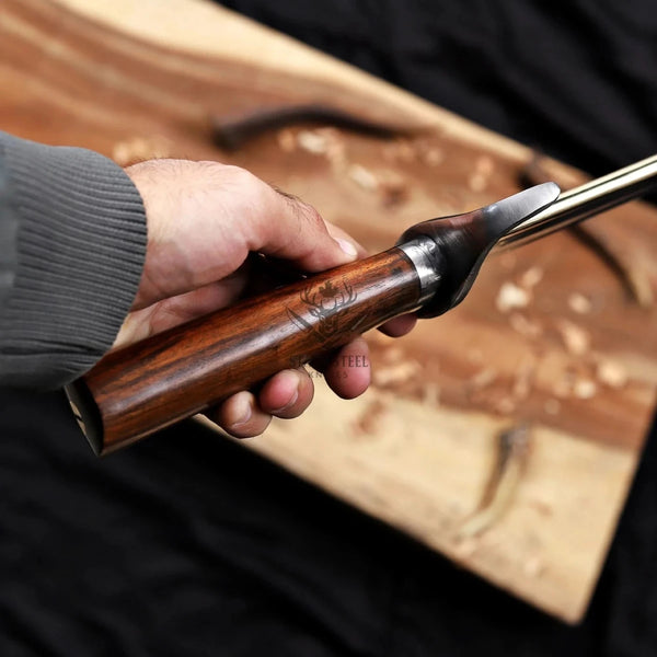 alamo musso damascus bowie knife rosewood handle handle close up rosewood grip and Damascus steel bolster