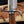 alamo musso damascus bowie knife rosewood handle guard close up curved steel guard and blade transition