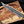 alamo musso damascus bowie knife rosewood handle blade close up damascus pattern and bevel detail