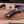Antler horn handle Feather Damascus bowie knife displayed with brand card