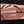 Arkansas toothpick knife with green G10 handle and brown leather sheath