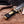 Black G10 handle with brass escutcheon plate and mosaic pins on D2 bowie knife