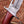 Macro shot of Damascus guard and pakka wood handle joint