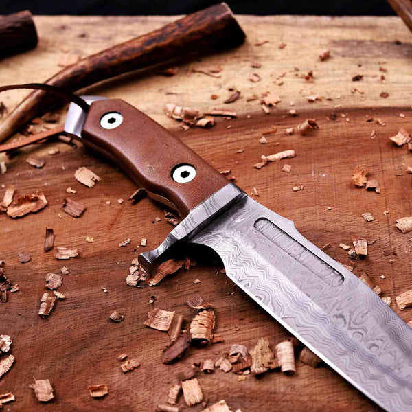 Full-tang brown micarta handle on a Damascus bowie knife