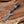 Decorative knife with a wooden handle on a wooden surface