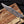 copper Damascus blade pattern close up on Bowie knife