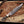 copper damascus bowie knife closeup of other side 