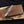 copper damascus bowie knife on wooden box