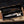 copper damascus knife inside wooden box display