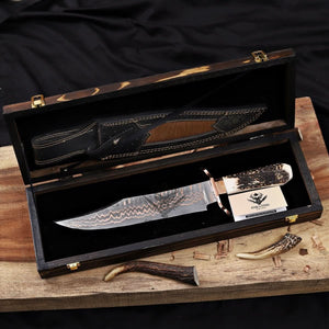 copper damascus knife inside wooden box display