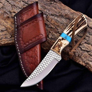 Knife with wooden handle and leather sheath on a wooden surface
